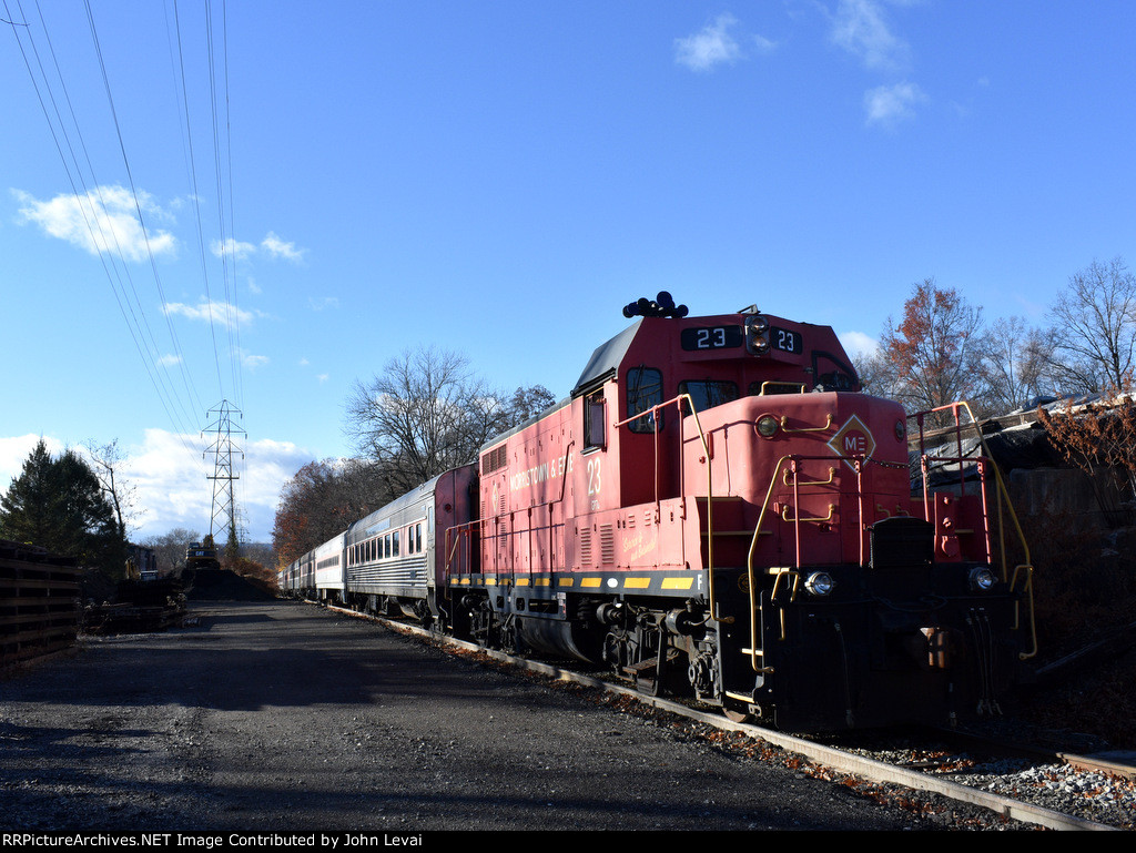 GP7u # 23 pushes the Polar Express train away from the Troy Hills Rd Xing 